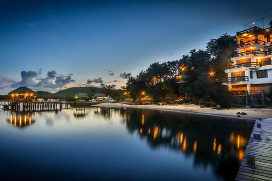 The house lights come on over the bay