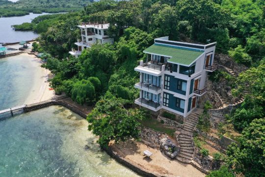 The seafront villas above the rocks