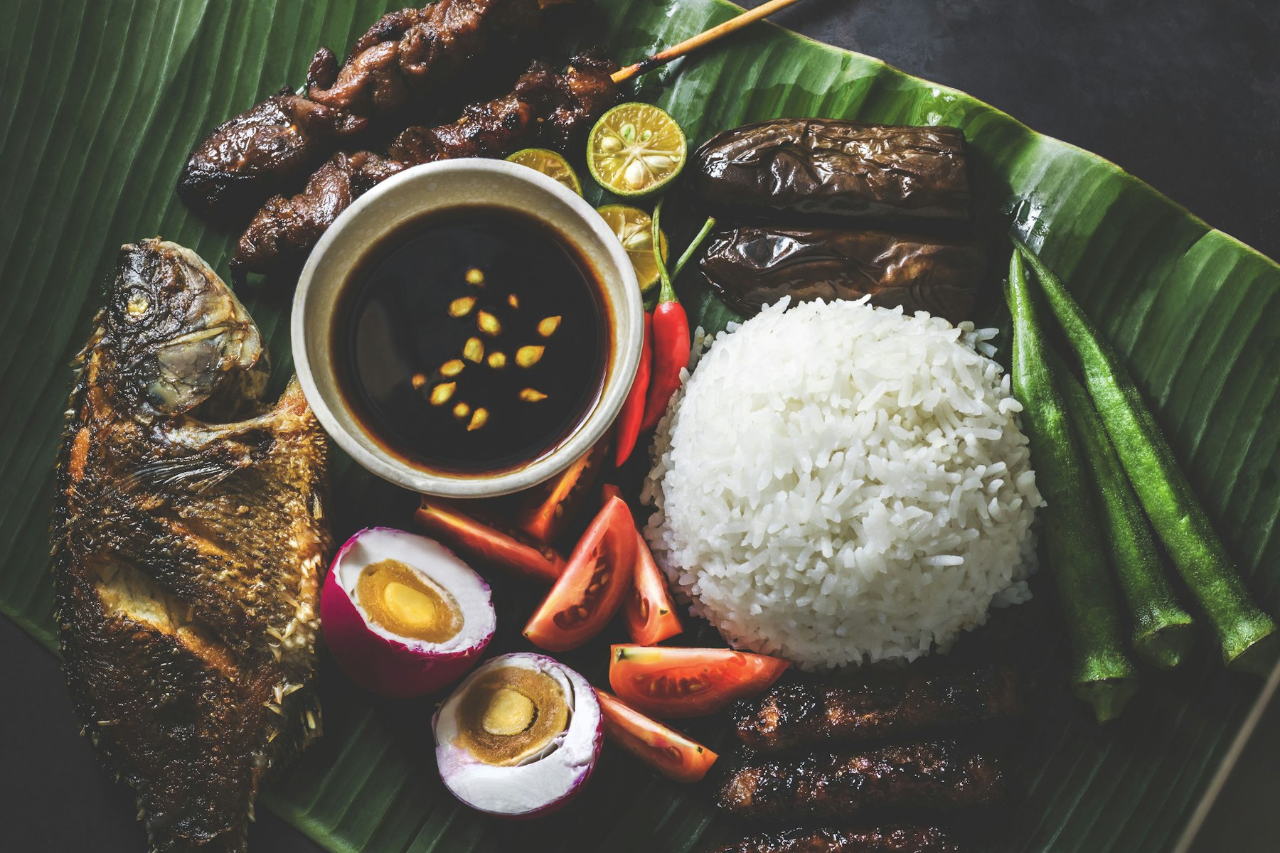 Home-cooked Filipino dishes served on banana leaf